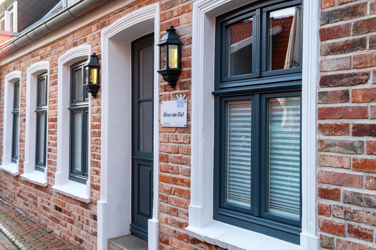 Haus Am Siel 01, Zentral Mit Eigenem Steg Villa Greetsiel Exterior foto